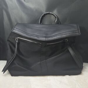 Botkier New York Mini Trigger Backpack Nylon Faux Leather Black Logo Straps Used